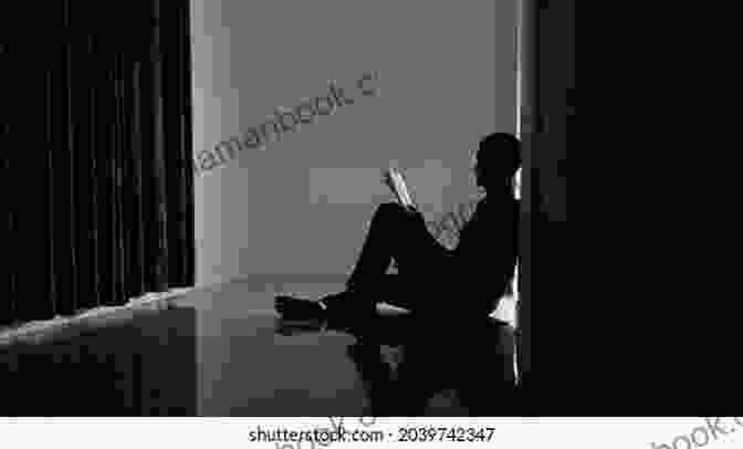 A Person Sitting Alone In A Dark Room, Their Face Obscured By Shadow. Pandemia: Haiku In Time Of Pandemic